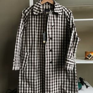 UNIQLO  NWT brown and white checked trench coat.